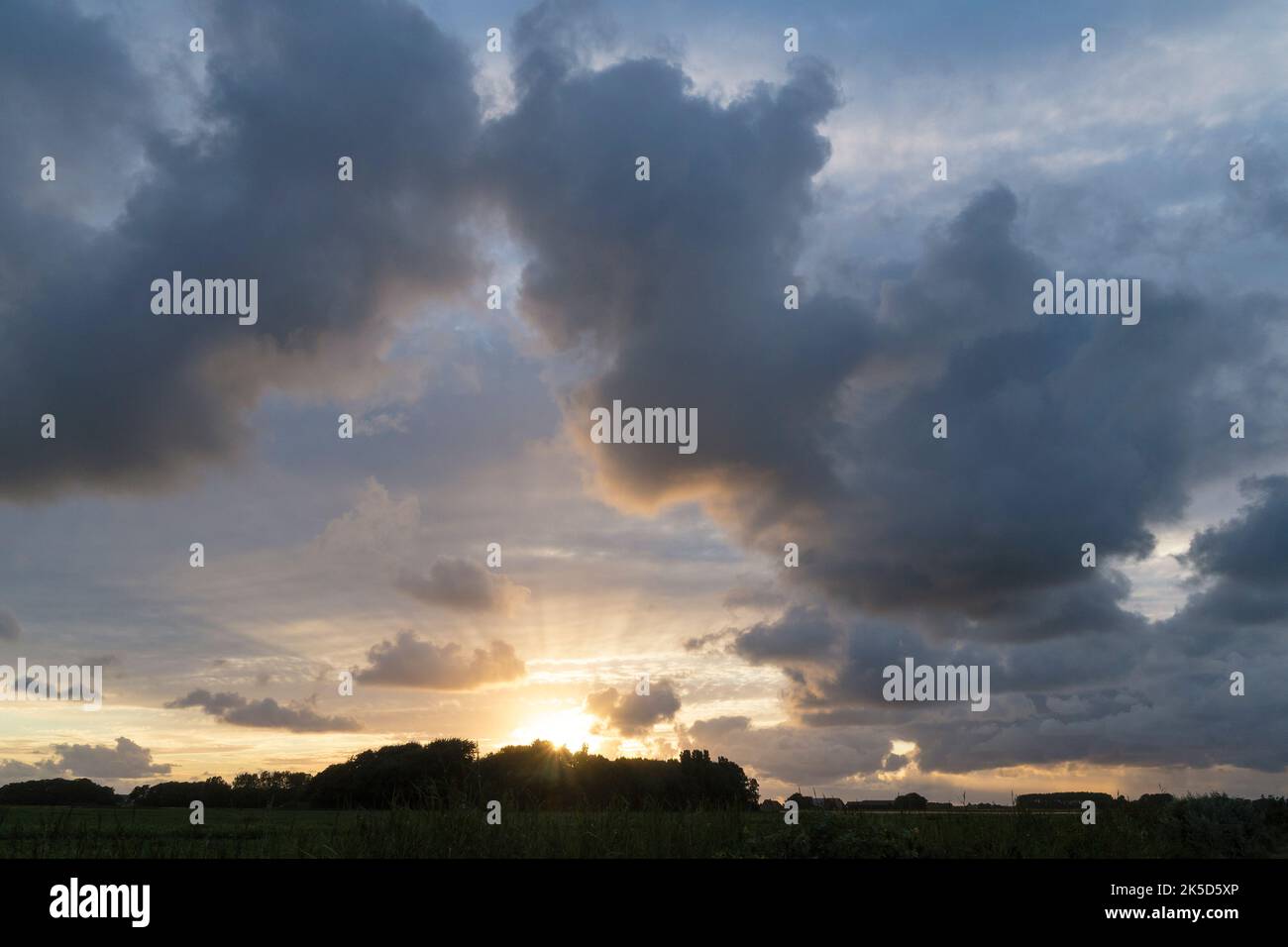 Netherlands, Texel, landscape near Den Burg, evening light, clouds Stock Photo