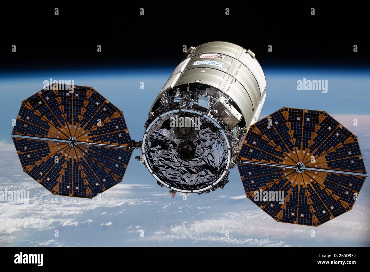 Northrop Grummans's Cygnus space freighter, with its prominent cymbal-shaped UltraFelx solar arrays, is pictured approaching the Internmational Space Station carrying 8,300 pounds of new science experiments, crew supplies, and station hardware to replenish the Expedition 66 crew. Stock Photo