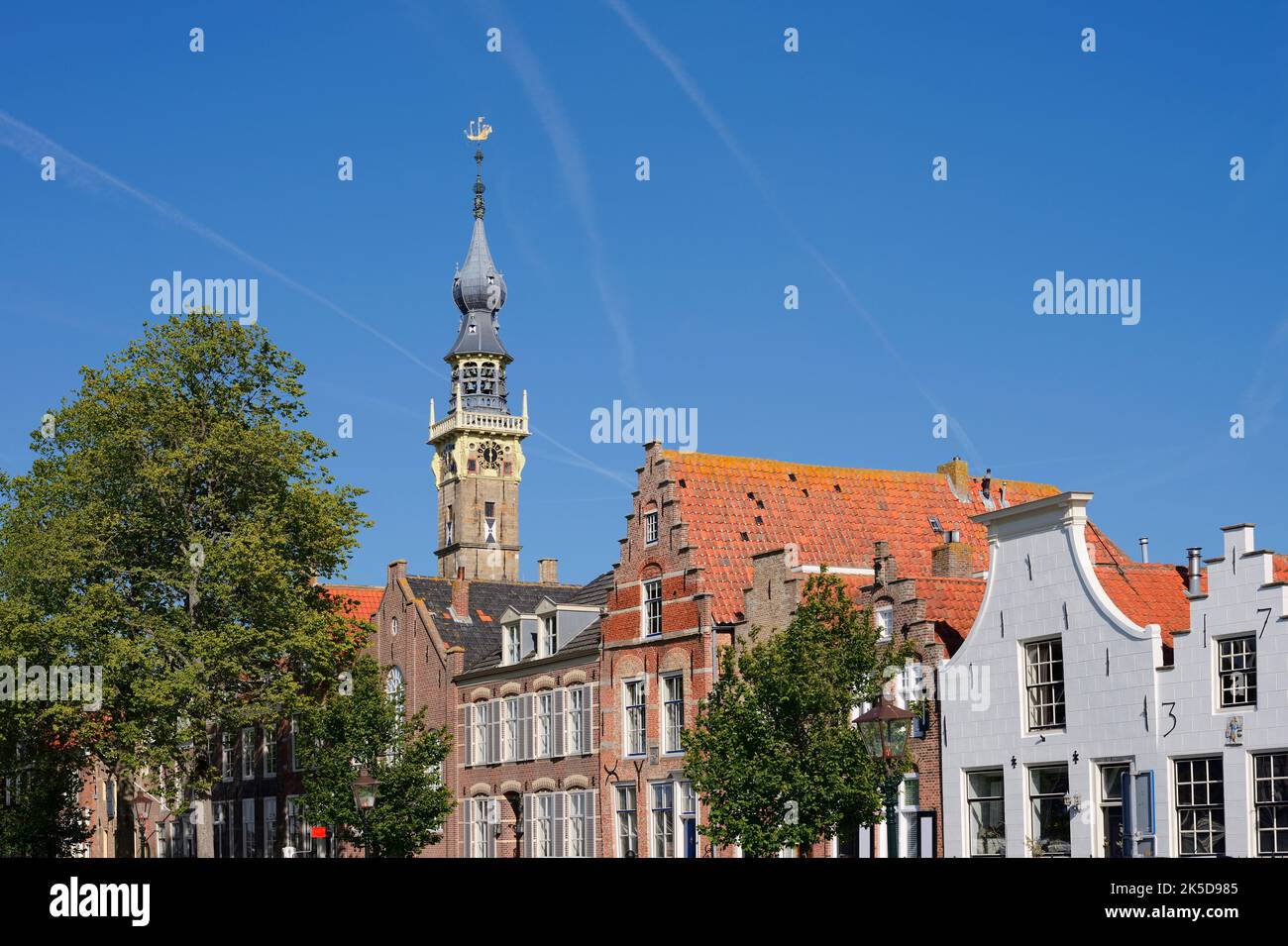 Town hall tower and houses, Veere, Walcheren, Zeeland, Netherlands Stock Photo