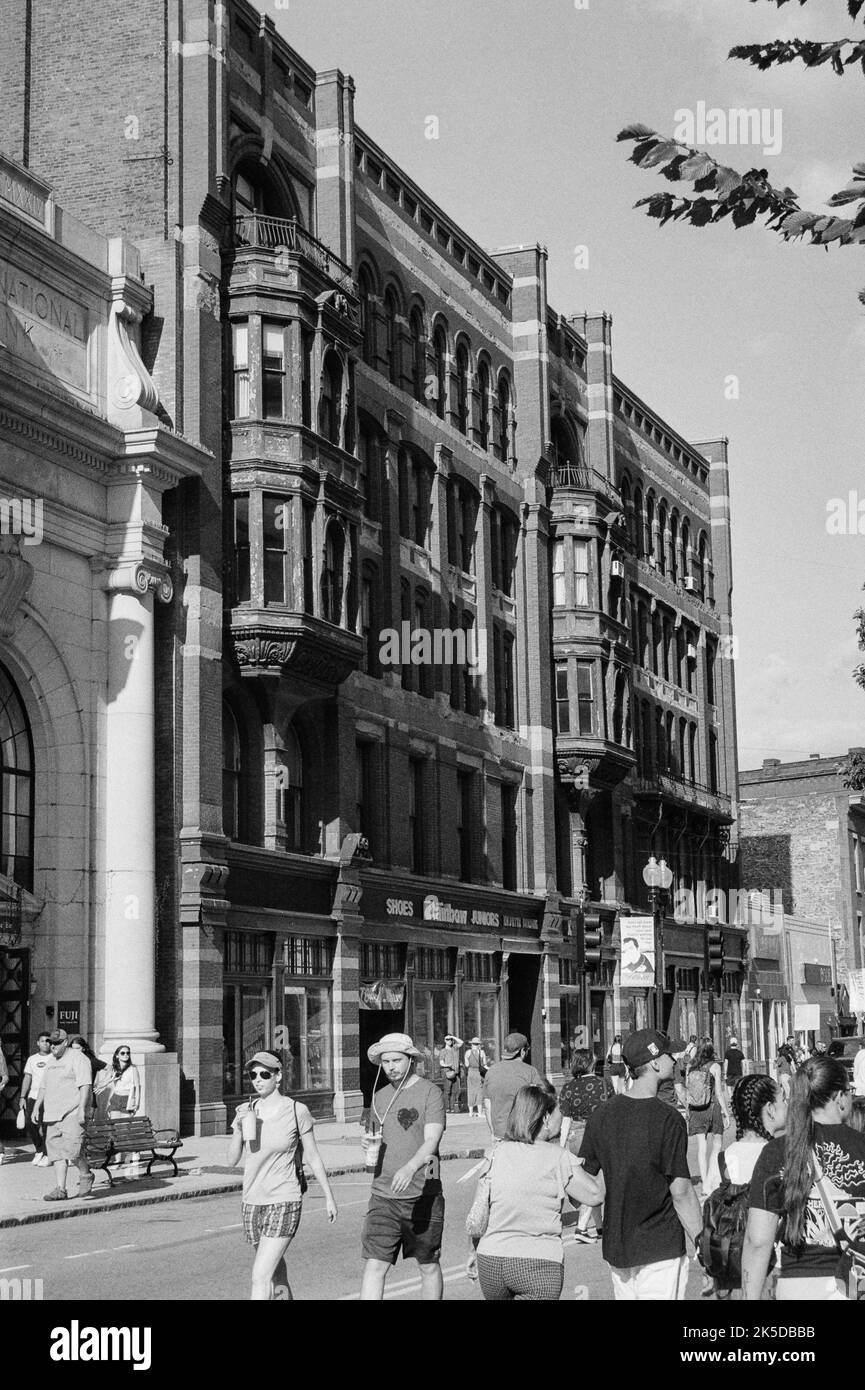 Beautiful yet weathered Victorian building line the street in historic