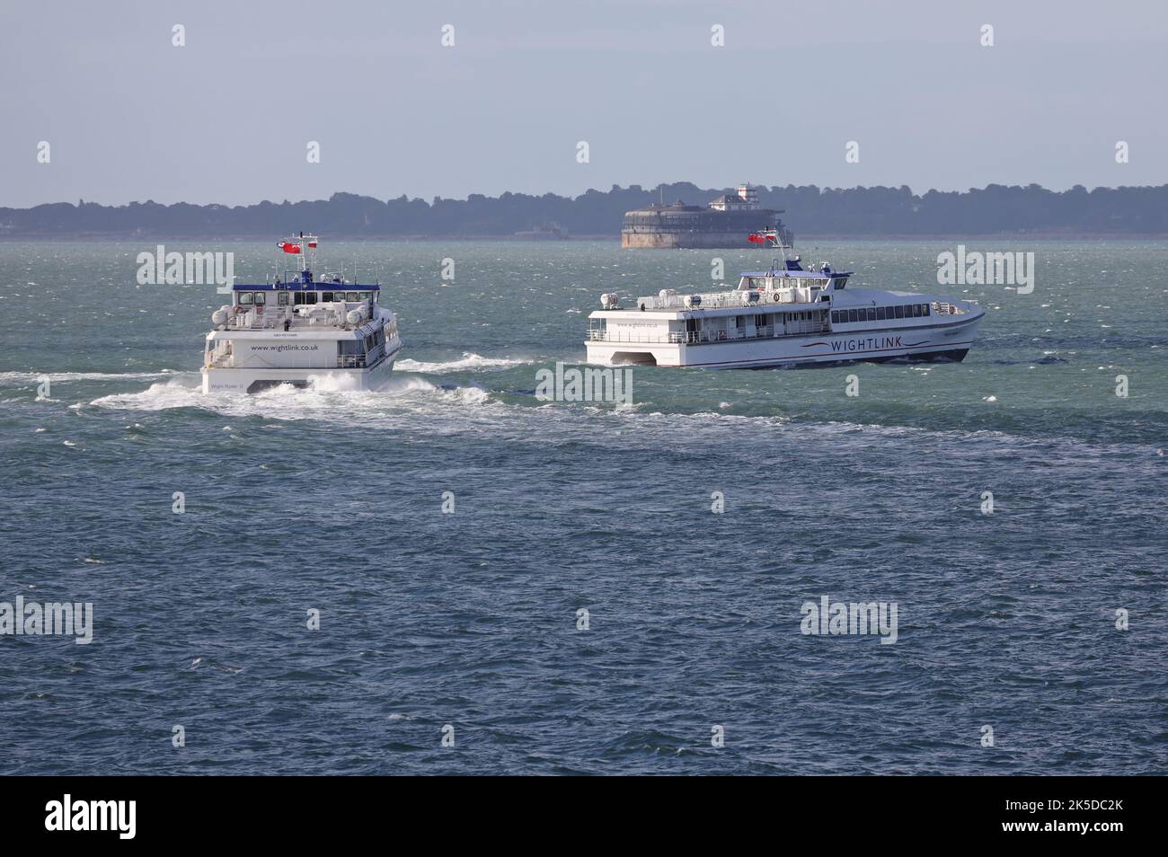 The Wightlink passenger ferries WIGHT RYDER I and II head towards the Isle of Wight Stock Photo