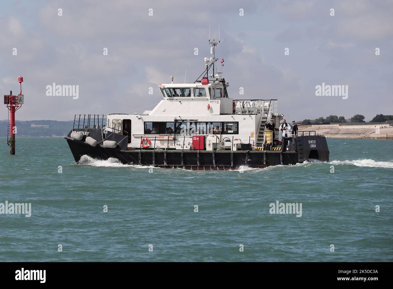 SD NETLEY heading into The Solent. The passenger vessel is operated by Serco Marine Services and serves the Naval Base Stock Photo