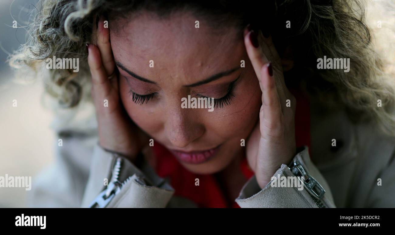 Latina woman frightened face hi-res stock photography and images - Alamy