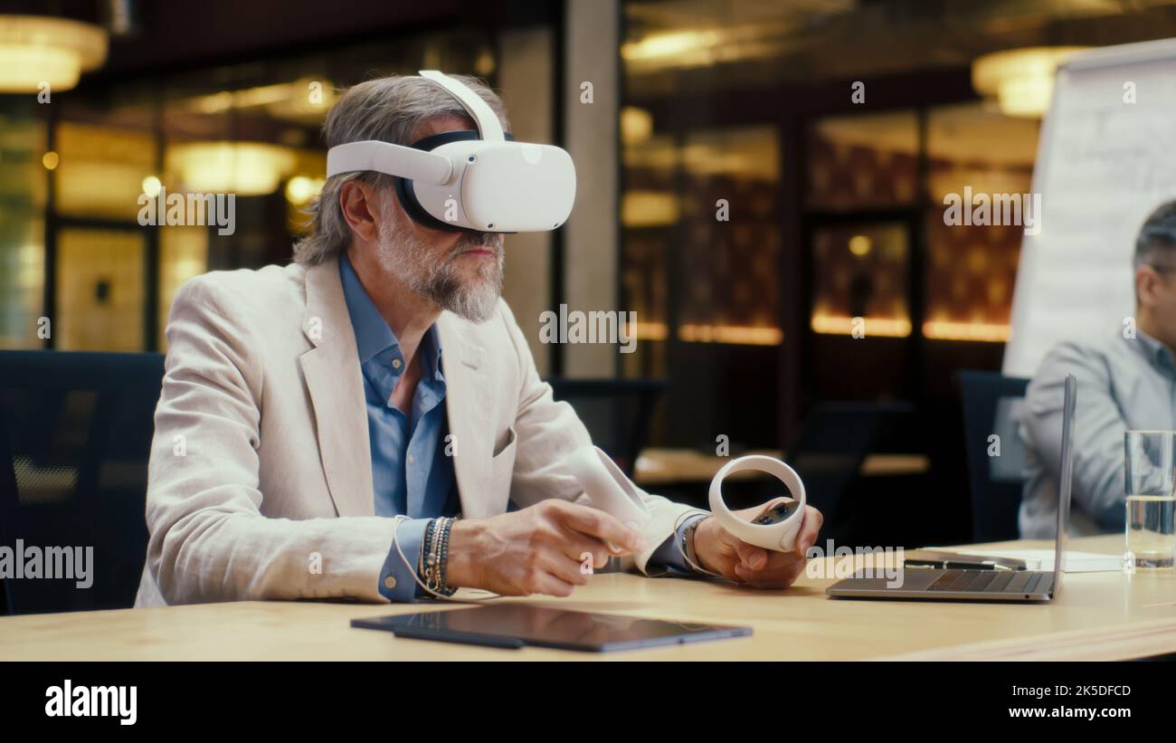 Businessman using laptop wearing headset hi-res stock photography and ...