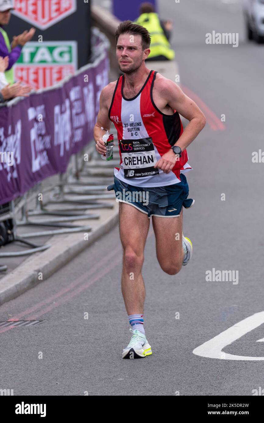 Matthew Crehan racing in the TCS London Marathon 2022 Elite Men's race in Tower Hill, City of London, UK. Stock Photo
