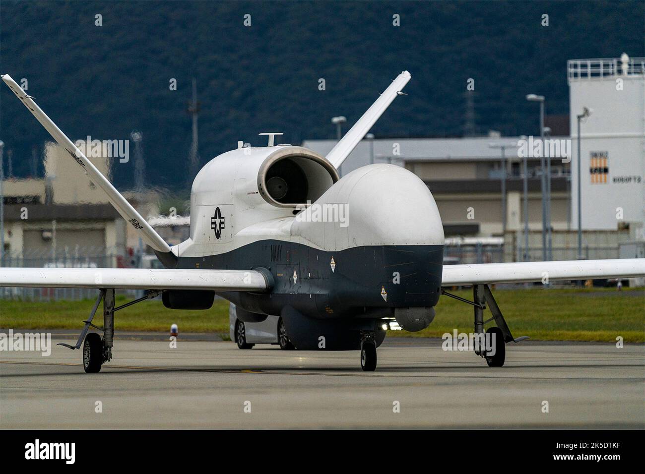 Iwakuni, Japan. 07 October, 2022. A U.S. Navy MQ-4C Triton high-altitude long endurance unmanned aerial vehicle with the Unmanned Patrol Squadron 19 taxis at Marine Corp Air Station Iwakuni, October 5, 2022 in Iwakuni, Japan. Credit: Cpl. Mitchell Austin/U.S Marines/Alamy Live News Stock Photo