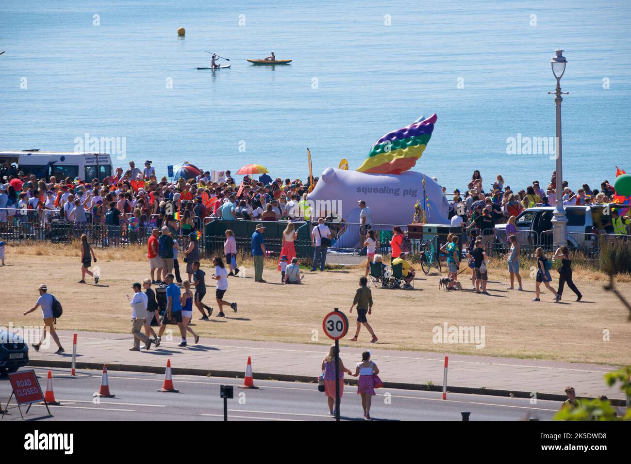 Brighton & Hove Pride Festival, Brighton & Hove, East Sussex, England. Preparations begin in the morning as all the flaots for the procession line the promenade alongside Hove Lawns. Stock Photo