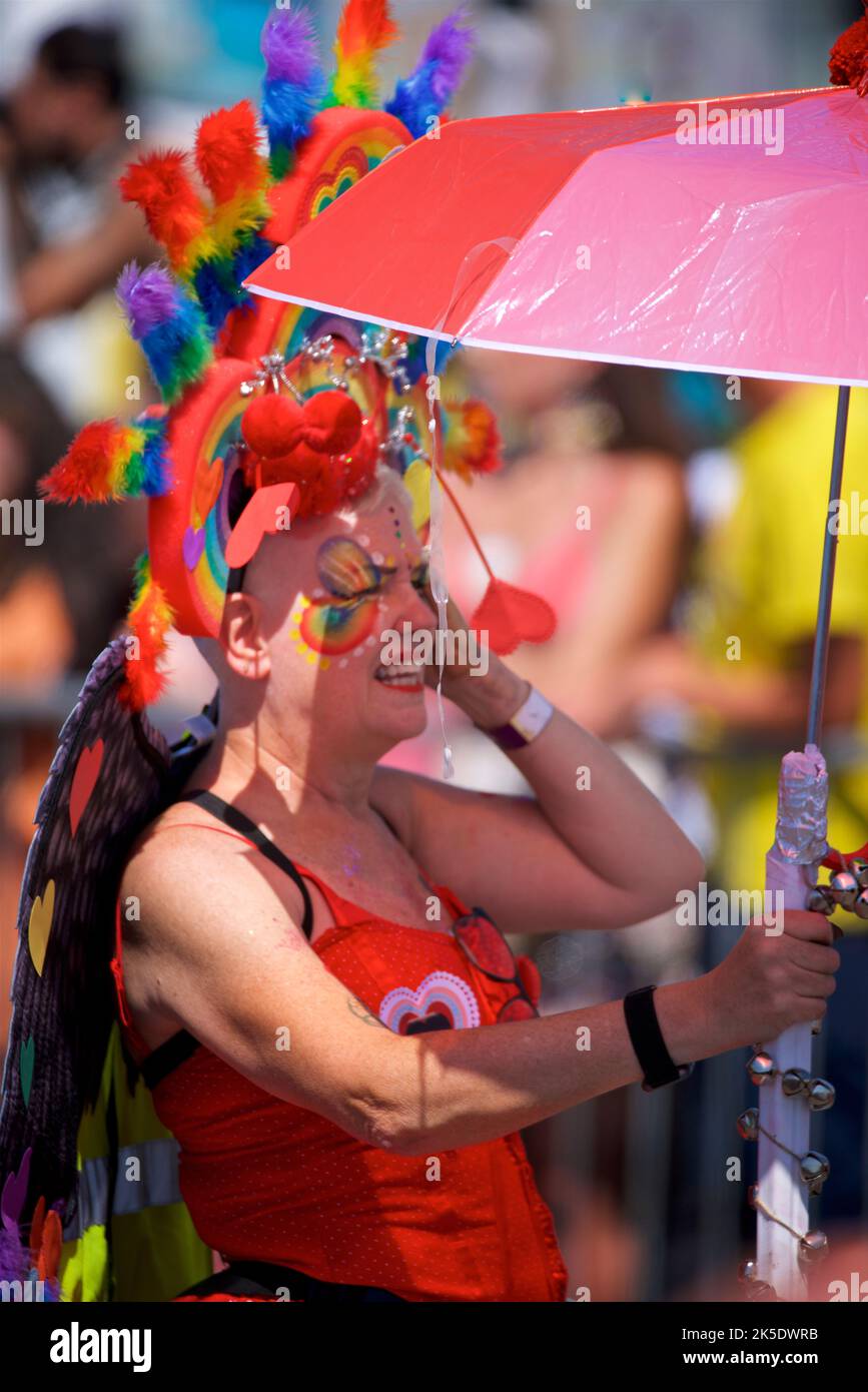 Brighton & Hove Pride Festival, Brighton & Hove, East Sussex, England. PArade participant enjoying the moment. Stock Photo