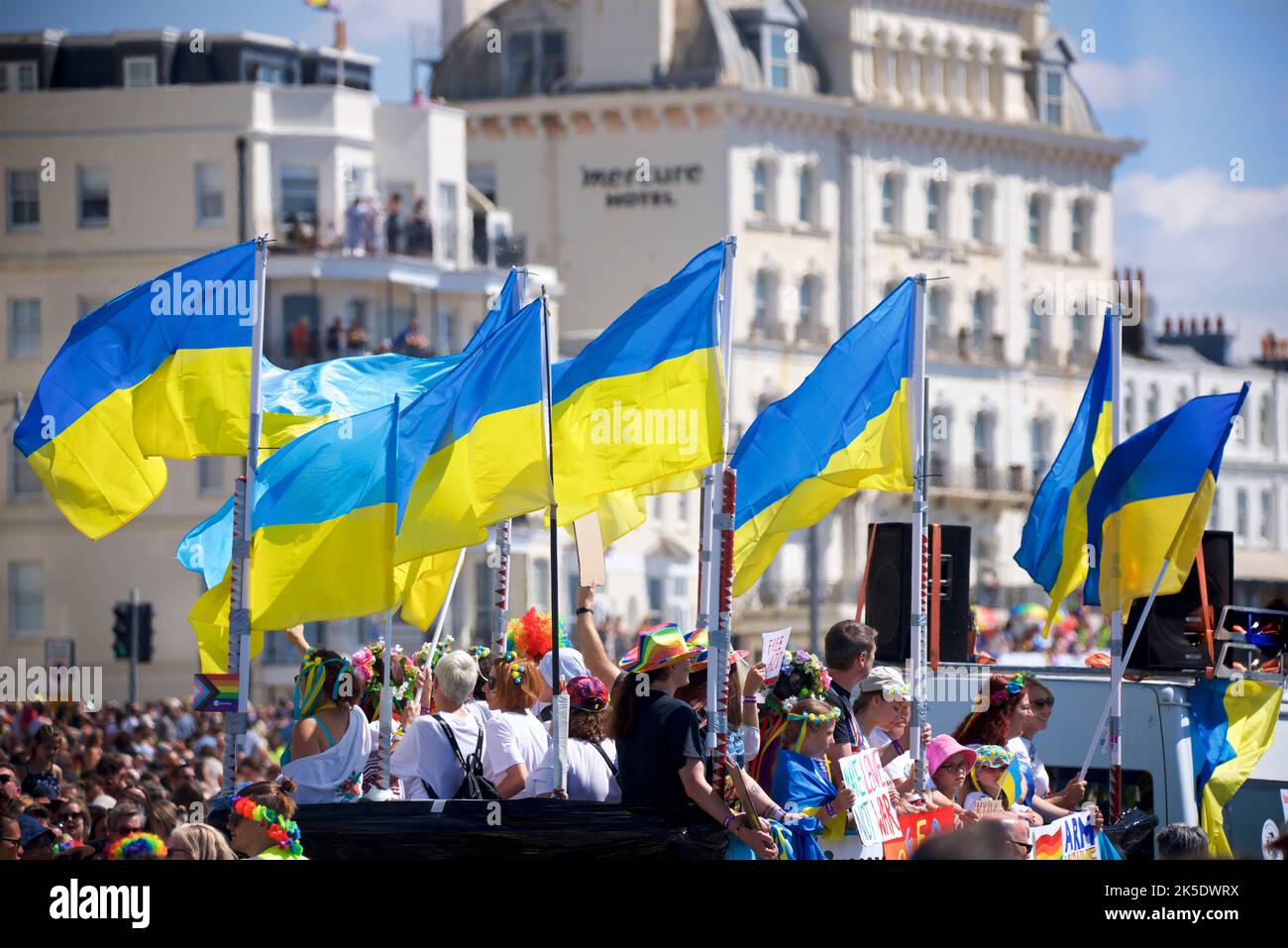 Brighton & Hove Pride Festival, Brighton & Hove, East Sussex, England. Bue and Yellow flags flown in support of Ukraine (and their war with Russia that escalated in 2022) Stock Photo