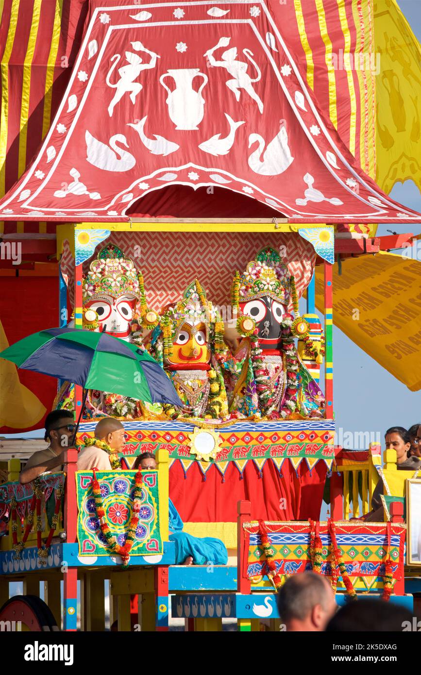 Detail of the Hare Krishna procession juggernaut, Brighton & Hove, England. The annual Rathayatra Festival for Lord Krishna and his devotees promenades along Hove esplanade each year. Krishna in his form of Jagannatha is pulled along on a large wooden juggernaut. Stock Photo