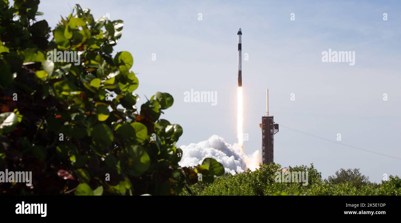 A SpaceX Falcon 9 rocket carrying the company's Crew Dragon spacecraft is launched on Axiom Mission 1 (Ax-1) to the International Space Station with Commander Michael López-Alegría of Spain and the United States, Pilot Larry Connor of the United States, and Mission Specialists Eytan Stibbe of Israel, and Mark Pathy of Canada aboard, Friday, April 8, 2022, at NASA’s Kennedy Space Center in Florida. The Ax-1 mission is the first private astronaut mission to the International Space Station. López-Alegría, Connor, Pathy, Stibbe launched at 11:17 a.m. from Launch Complex 39A at the Kennedy Space Ce Stock Photo