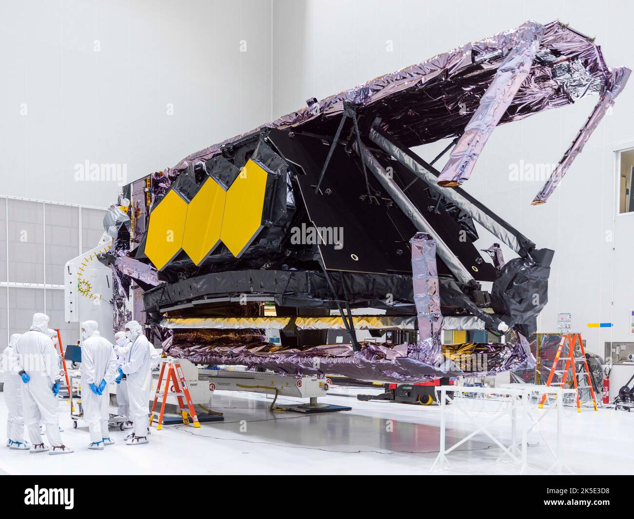 The James Webb Space Telescope (JWST in the cleanroom at the launch site at the Guiana Space Center in French Guiana after a 5,800-mile move from the USA. After its arrival, Webb was carefully lifted from its packing container and then raised vertical. This is the same configuration Webb will be in when it is inside its launch vehicle, the Ariane 5 rocket.  An optimised version of a NASA image by experienced lead photographer Chris Gunn. Credit: NASA/Chris Gunn. For editorial use only. Stock Photo