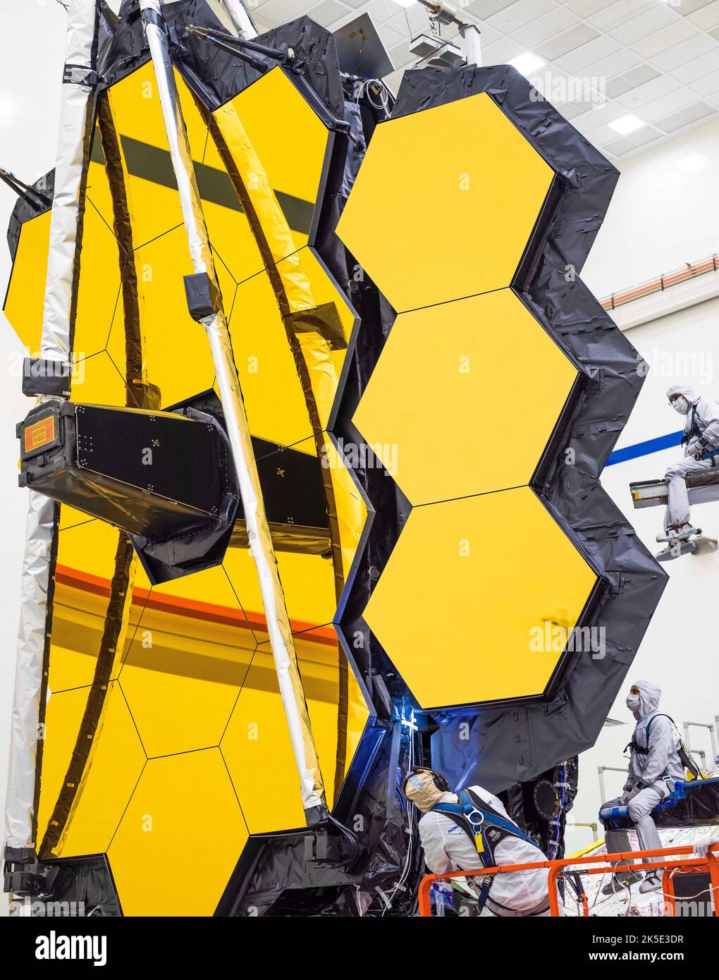 As part of final tests, the James Webb Space Telescope's 6.5 meter mirror was commanded to fully expand and lock itself into place. Making the testing conditions close to what Webb will experience in space helps to ensure the observatory is fully prepared for its science mission one million miles away from Earth.All of the final thermal blanketing and innovative shielding designed to protect its mirrors and instruments from interference were in place during testing An optimised version of a NASA image by experienced lead photographer Chris Gunn. Credit: NASA/Chris Gunn. Editorial use only. Stock Photo