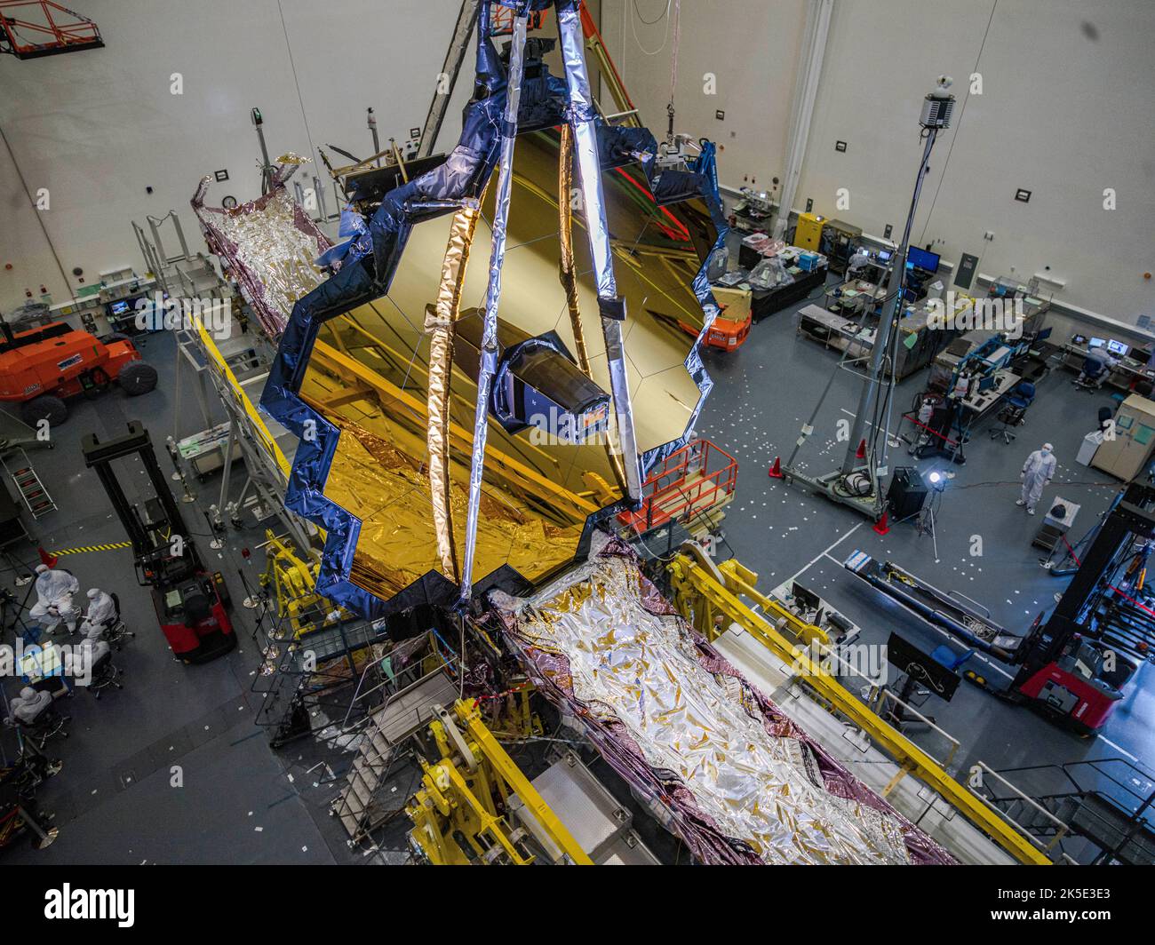 Preparing the James Webb Space Telescope (JWST) for space. Webb has the largest mirror of its kind that NASA has ever built. In March 2020, testing teams deployed Webb's 21'4' (6.5m) primary mirror into the same configuration it will have when in space.Like the art of origami, Webb is a collection of movable parts that have been specifically designed to fold to a compact formation that is considerably smaller than when the observatory is fully deployed. An optimised version of a NASA image by experienced lead photographer Chris Gunn. Credit: NASA/Chris Gunn. For editorial use only Stock Photo