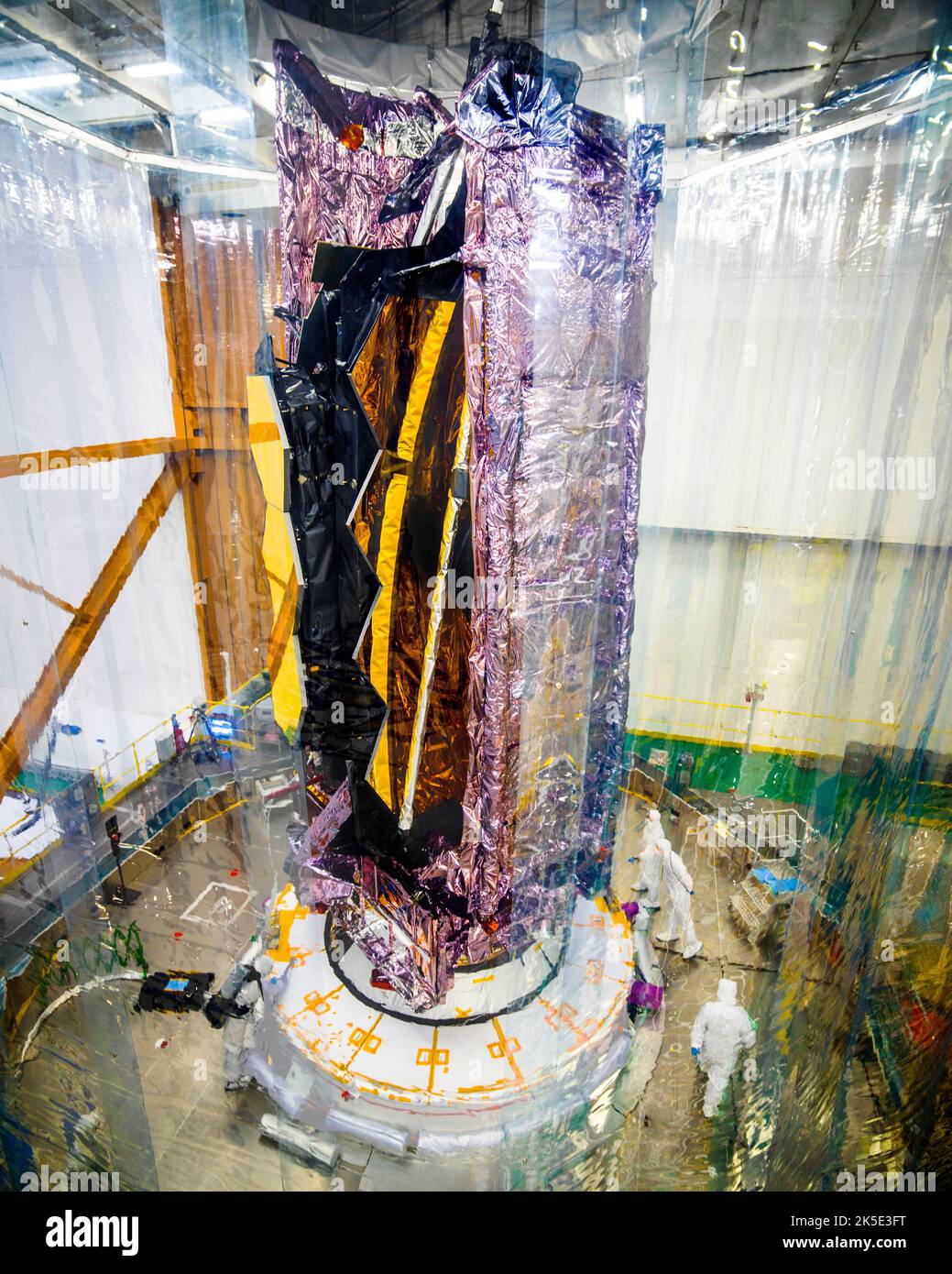 James Webb Space Telescope (JWST) on Launcher. This image shows the James Webb Space Telescope atop its launch vehicle, but before it was encapsulated in the rocket fairing. You can see a protective clean tent around the telescope. The JWST was launched on 25 December 2021  An optimised version of a NASA image by experienced lead photographer Chris Gunn. Credit: NASA/Chris Gunn. For editorial use only. Stock Photo
