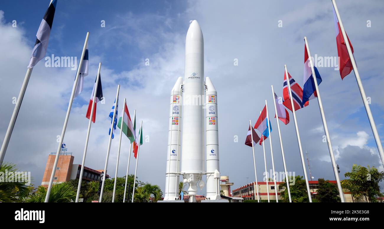 A mockup of Arianespace's Ariane 5 rocket is seen at the entrance to the Guiana Space Center in Kourou, French Guiana, 21 December 2021, 4 days before the scheduled launch. The James Webb Space Telescope (sometimes called JWST or Webb) is a large infrared telescope with a 21.3 foot (6.5 meter) primary mirror. The observatory is scheduled to launch later in the week and will study every phase of cosmic historyÑfrom within our solar system to the most distant observable galaxies in the early universe.  Image by senior NASA photographer Bill Ingalls / Credit B.Ingalls/NASA. Stock Photo