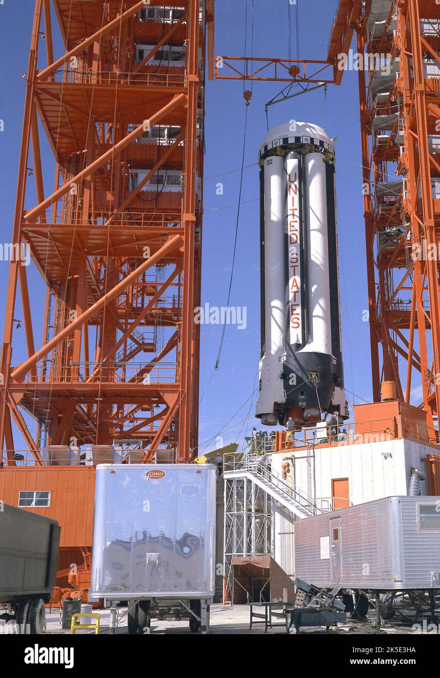 The First Saturn Rocket SA-1 arrives at NASA's Kennedy Space Center, Florida. The SA-1 mission was used to demonstrate the validity of the clustered engine concept as well as test the aerodynamic and structural design of the Saturn I booster. Here, the S-1 stage for the SA-1 mission is being installed on the launch pad for launch. Today, Marshall Space Center is developing NASA's Space Launch System, the most powerful rocket ever built that will be capable of sending astronauts deeper into space than ever before, including to Mars. 15 August 1961. An optimised NASA image: Credit: NASA Stock Photo