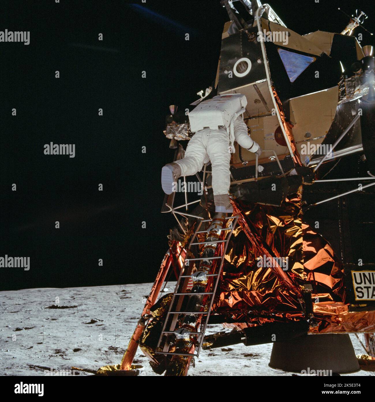 Apollo 11. First moon landing, 20 July 1969. Here, Astronaut Buzz Aldrin steps off the ladder from the Lunar Module and onto the moon's surface. Photo by Astronaut Neil Armstrong, who had, for 18 minutes, been the only human to have set foot on the moon. After this photo was taken, humans in the plural achieved this goal. For this reason, perhaps this is one of the most compelling photo of all moon landings. An ptimised NASA image. Credit: NASA Stock Photo