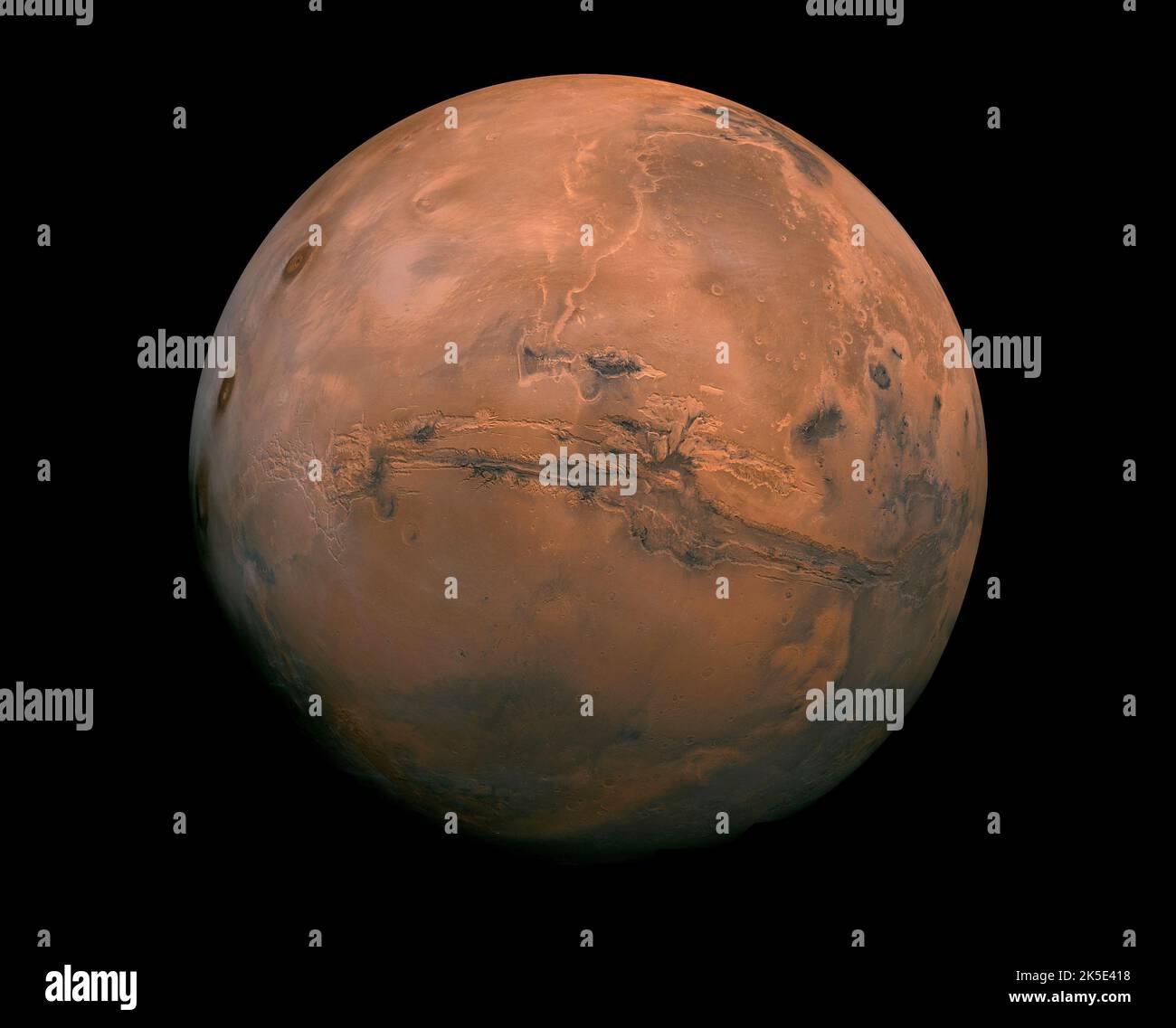 The planet Mars. A Mosaic of NASA imagery of Mars showing the Valles Marineris hemisphere of Mars projected into point perspective, a view similar to that which one would see from a spacecraft. The viewer's distance is envisioned at approximately 2,500 kilometers from the Mars surface. Image composed from over 100 Viking Orbiter images of Mars.  An optimised version of an original NASA image. Credit: NASA, Stock Photo