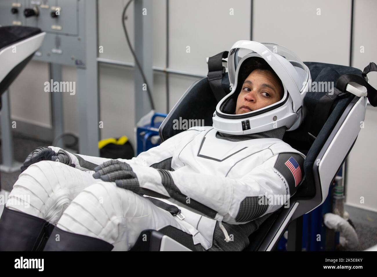 Crew-4 mission astronaut Jessica Watkins relaxes in the suit room in the Astronaut Crew Quarters inside Kennedy Space Center’s Neil A. Armstrong Operations and Checkout Building on April 27, 2022. A team of SpaceX suit technicians assisted the crew as they put on their custom-fitted spacesuits and checked the suits for leaks. Watkins, along with Bob Hines, Kjell Lindgren, and Samantha Cristoforetti, will launch aboard SpaceX’s Crew Dragon, powered by the company’s Falcon 9 rocket, to the International Space Station as part of NASA’s Commercial Crew Program. Crew-4 is scheduled to lift off toda Stock Photo