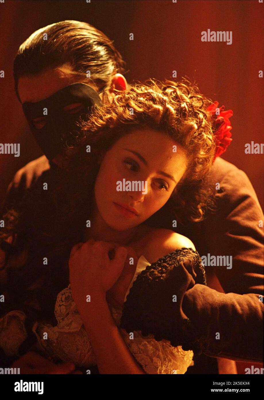 GERARD BUTLER, EMMY ROSSUM, THE PHANTOM OF THE OPERA, 2004 Stock Photo