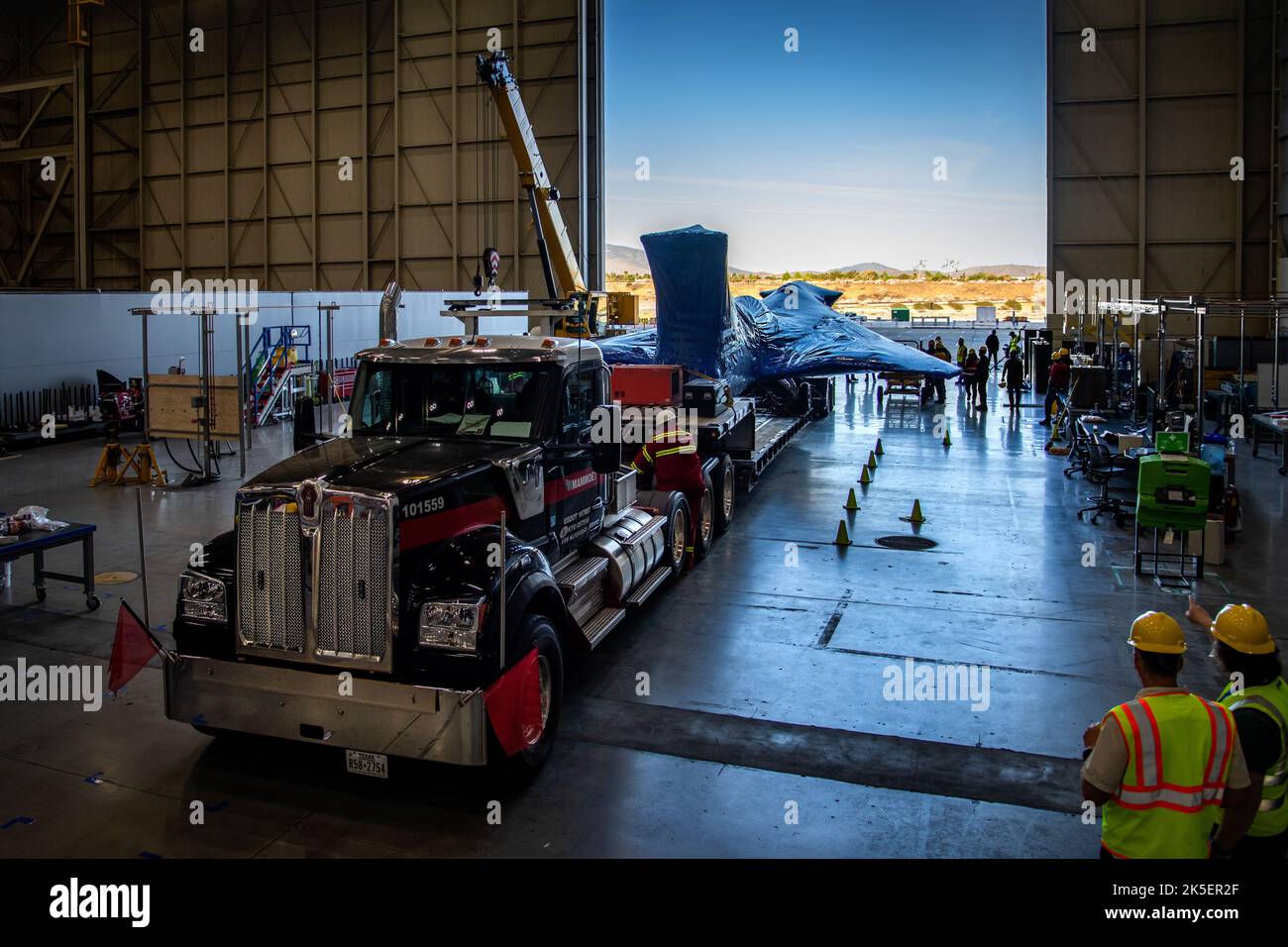 The X-59, NASA’s quiet supersonic technology experimental aircraft, arrives back at Lockheed Martin’s Skunk Works facility in Palmdale, California, following several months of critical ground testing in Ft. Worth, Texas Stock Photo