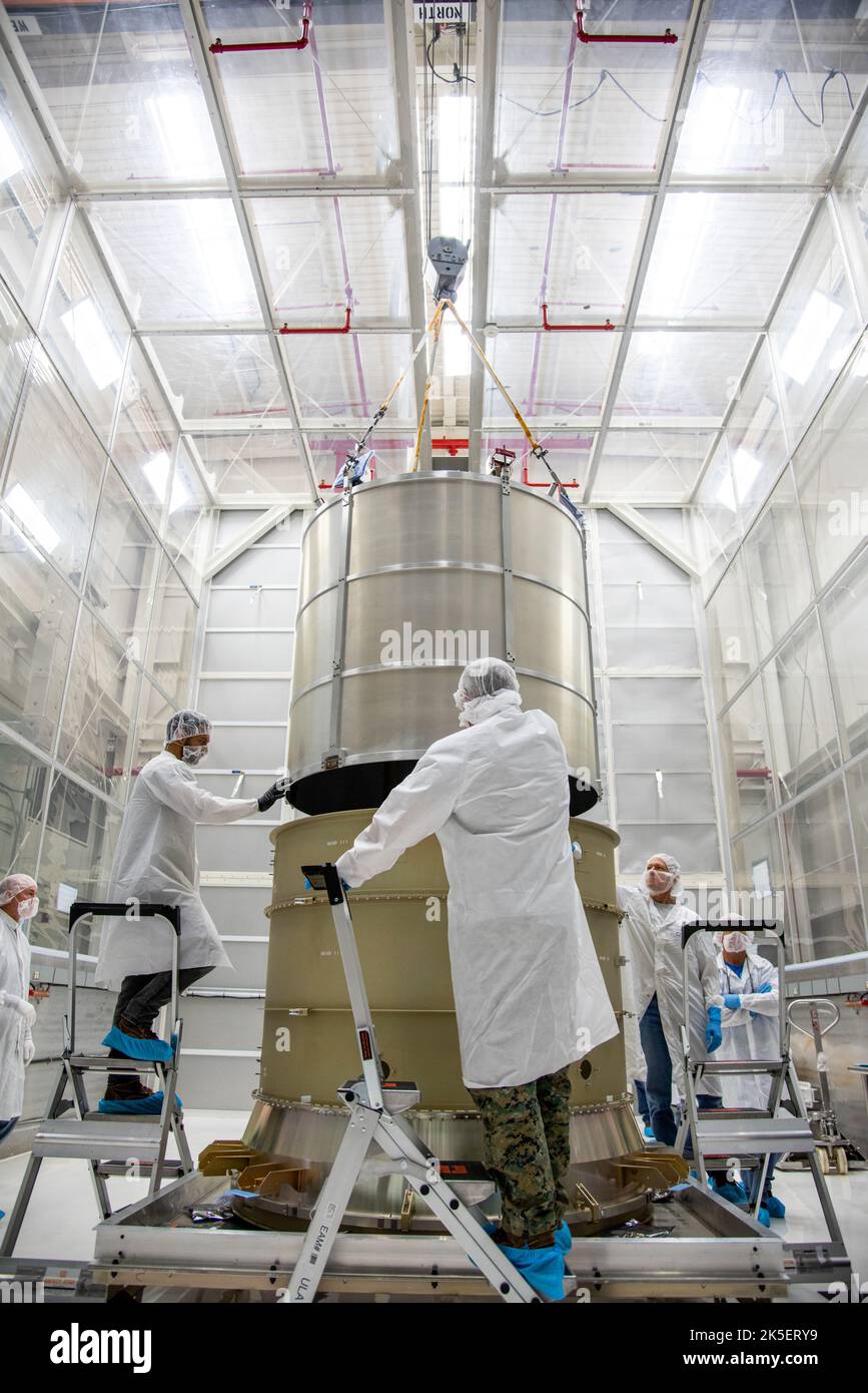 Technicians lower the payload adapter separation systems canister for the Low-Earth Orbit Flight Test of an Inflatable Decelerator (LOFTID) into the payload adapter canister as part of launch preparations inside Building 836 at Vandenberg Space Force Base (VSFB) in California on Sept. 1, 2022. LOFTID is the secondary payload on NASA and the National Oceanic and Atmospheric Administration’s (NOAA) Joint Polar Satellite System-2 (JPSS-2) satellite mission. JPSS-2 is the third satellite in the Joint Polar Satellite System series. It is scheduled to lift off from VSFB on Nov. 1 from Space Launch C Stock Photo