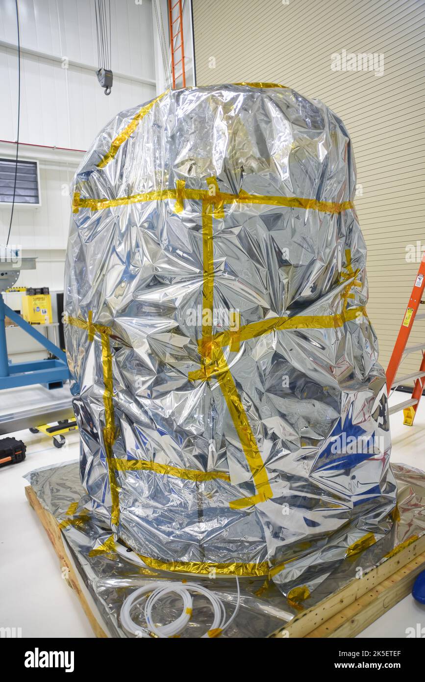 NASA’s Low-Earth Orbit Flight Test of an Inflatable Decelerator (LOFTID) arrives for processing inside Building 836 at Vandenberg Space Force Base in California Monday, Aug. 15, 2022. LOFTID is a rideshare launching with the National Oceanic and Atmospheric Administration’s (NOAA) Joint Polar Satellite System-2 (JPSS-2) satellite. Teams working at Astrotech will prepare LOFTID to mate it with JPSS-2. After that a team will stack the encapsulated spacecraft and re-entry vehicle on a United Launch Alliance (ULA) Atlas V 401 rocket. The technology demonstration mission is slated to test new capab Stock Photo
