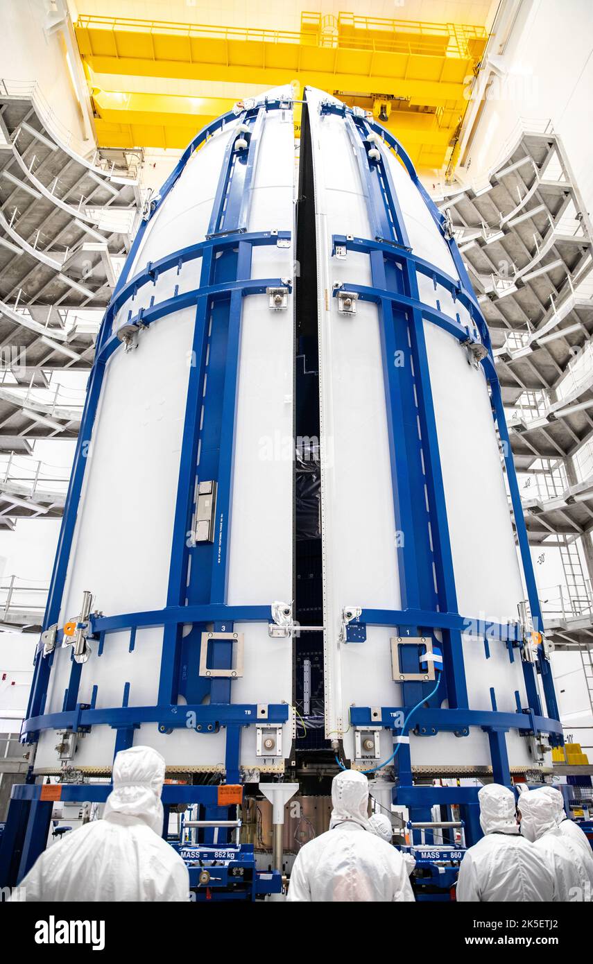 The United Launch Alliance Atlas V payload fairings are being secured