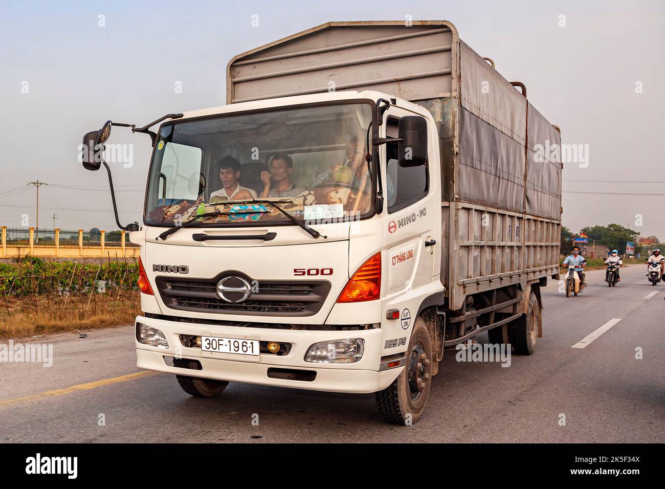 Vietnamese truck on highway from Hai Phong to Hanoi, Vietnam Stock