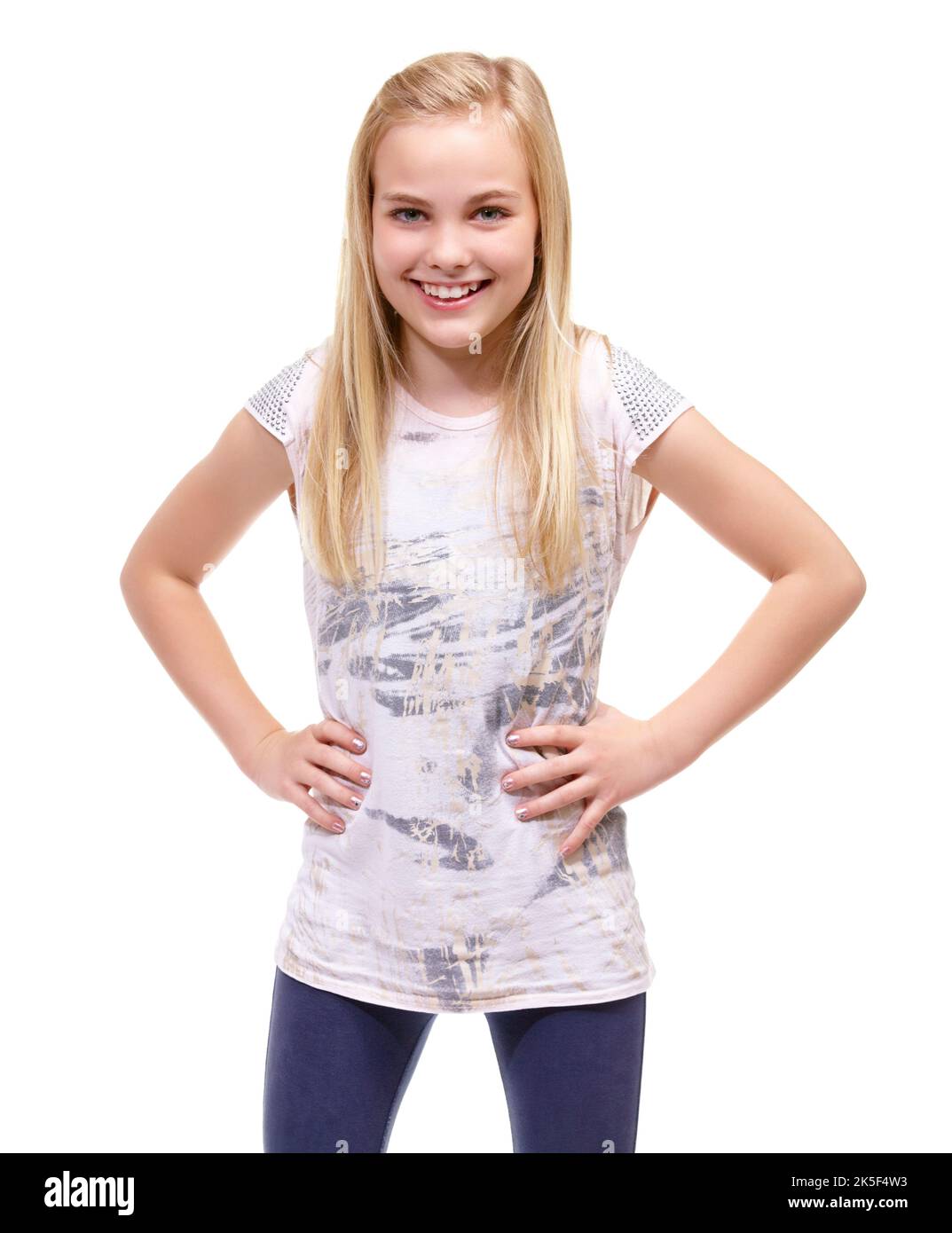 Shes got confidence. Young girl posing confidently against a white background. Stock Photo