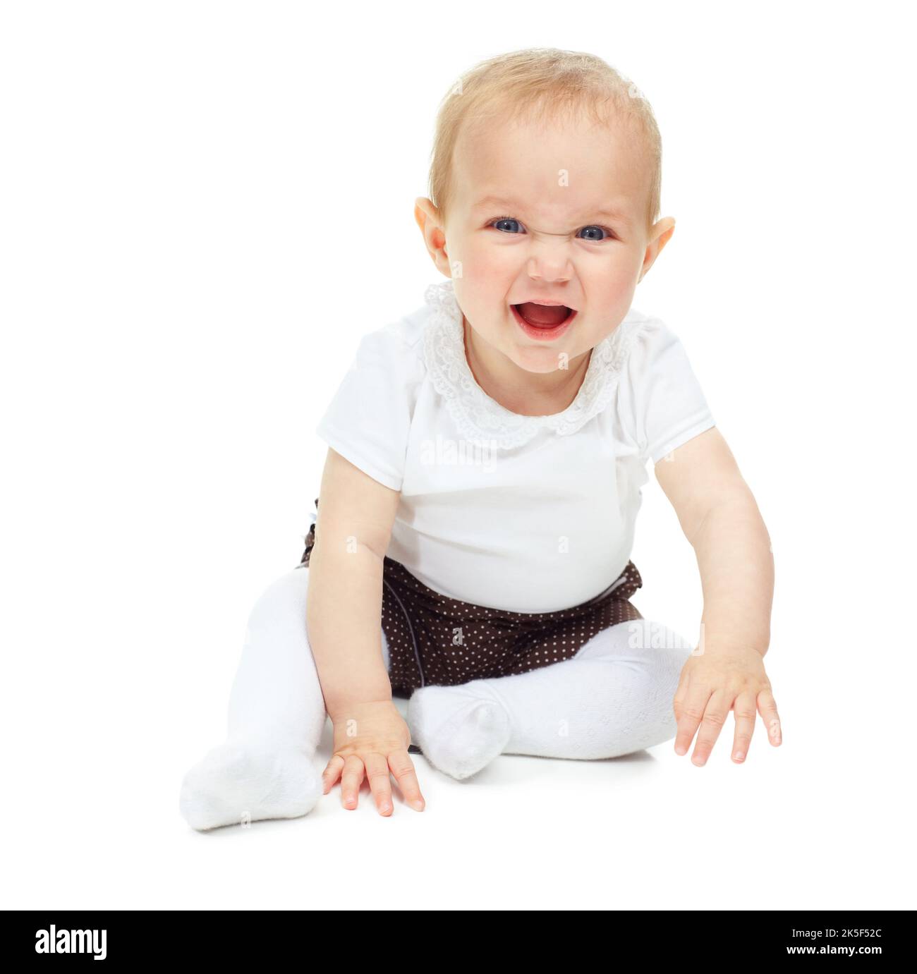 Hey you. A beautiful little baby girl isolated against a white background Stock Photo Alamy