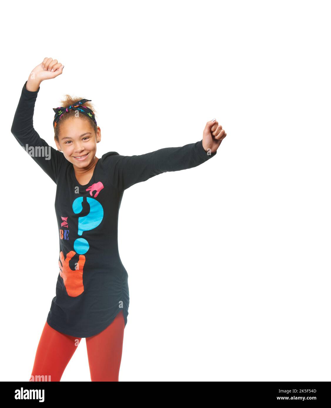 Fun and feeling carefree. Studio shot of a young girl dancing isolated on white. Stock Photo