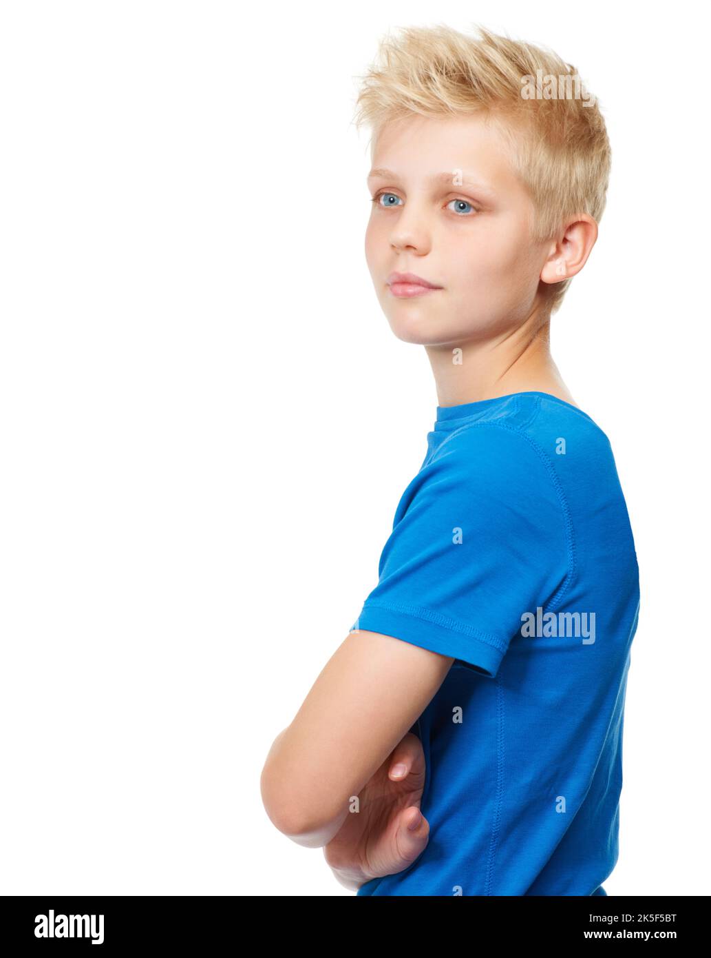 Boyhood dreams. Cropped studio shot of a blond teenage boy standing