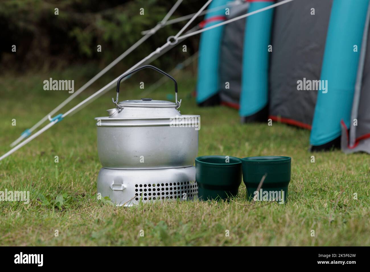 Camp stove and cups. Stock Photo