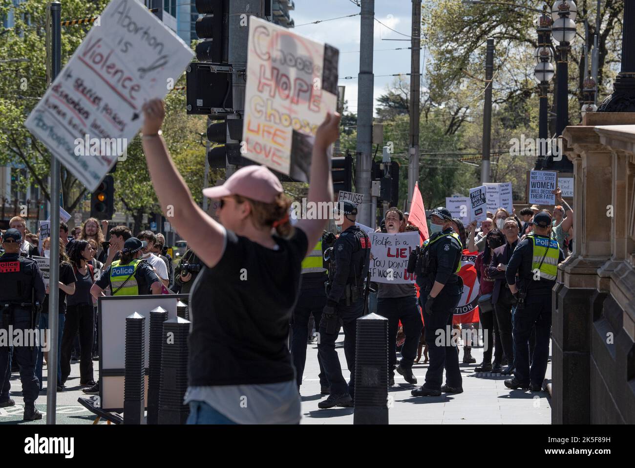 October 8th, 2022, Melbourne, Australia. An anti-abortion protester holds up signs at a pro-abortion counter-rally in response to MP Bernie Finn's March for the Babies, which happens annually. Credit: Jay Kogler/Alamy Live News Stock Photo