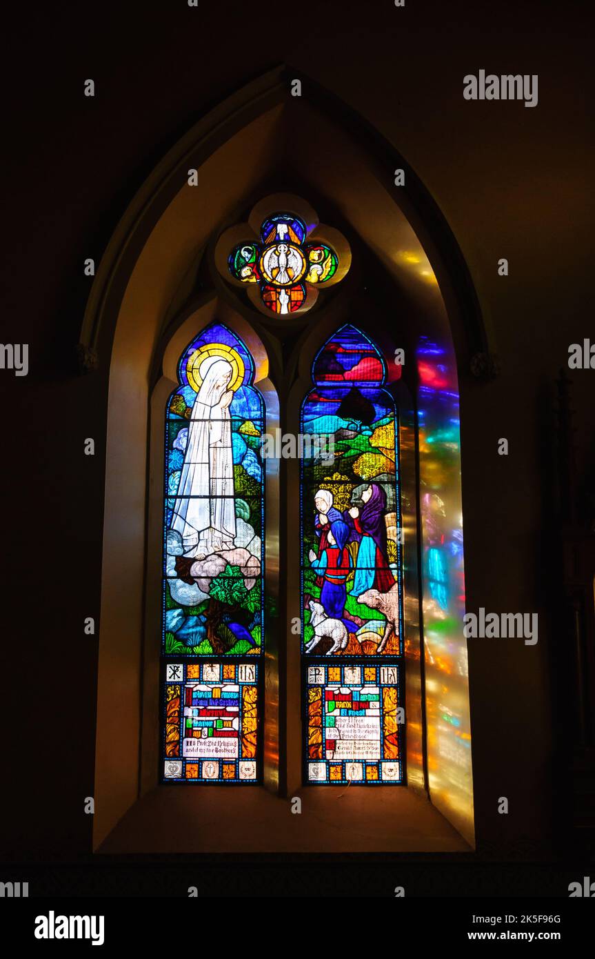 Stained glass window in Our Lady of the Rosary Catholic Church