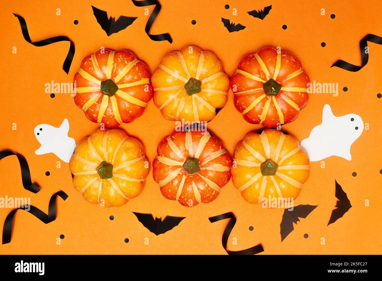 Halloween concept, Scary smile pumpkins with bat and ghost arranged in ...