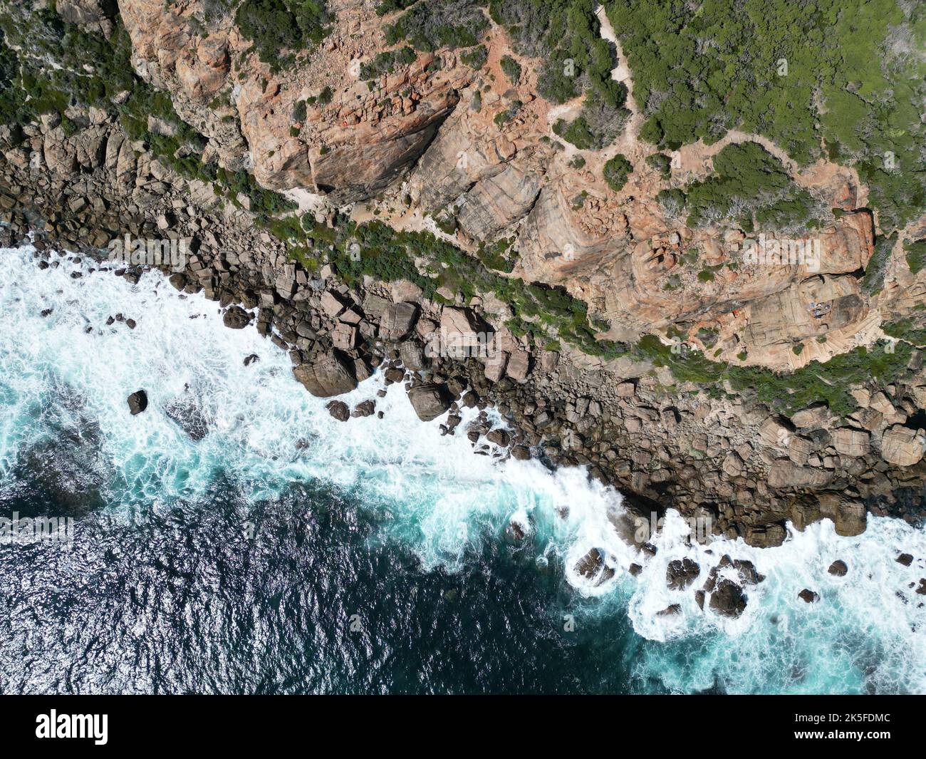 An aerial shot of the ocean bay of Wilyabrup Sea Cliffs, Western Australia Stock Photo
