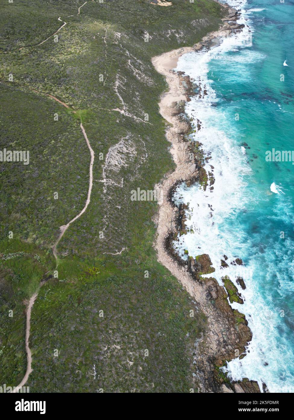 An vertical shot of the ocean bay of Wilyabrup Sea Cliffs, Western Australia Stock Photo