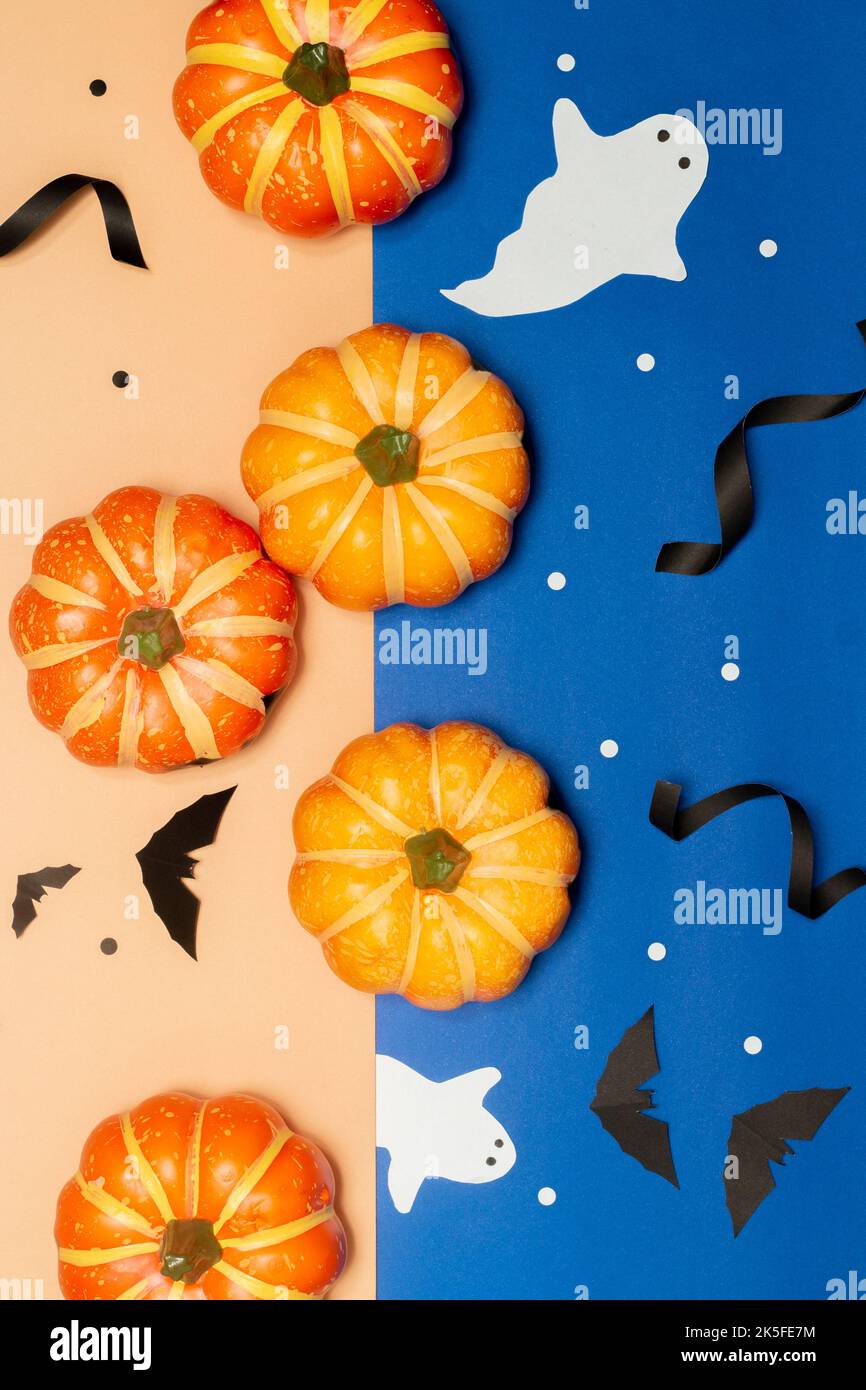 Halloween concept, Scary smile pumpkins with ghost and black bat on ...