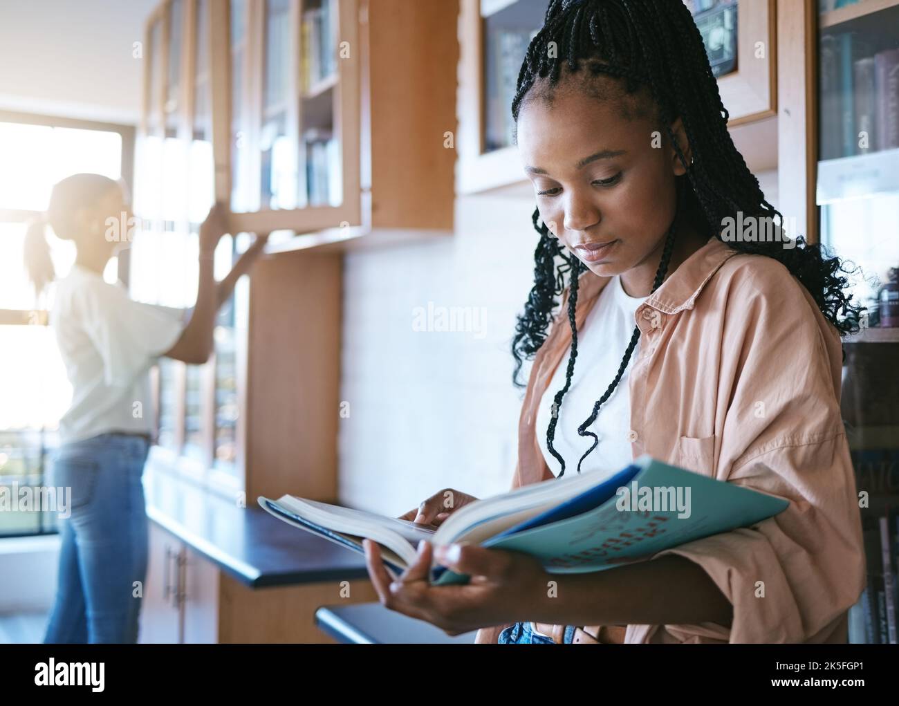 College student, black woman library and reading books for education