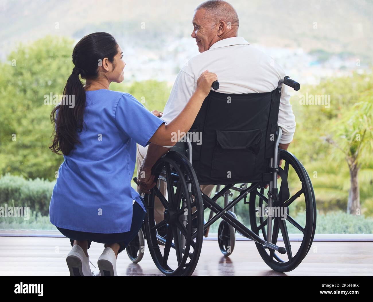 Healthcare, disability and man in wheelchair with nurse on retirement