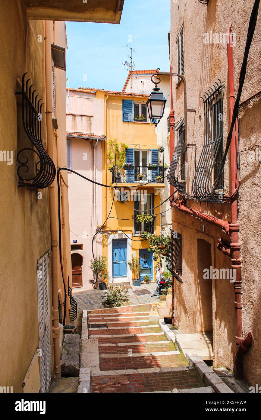 A vertical shot of a narrow street in the beautiful old town Stock ...