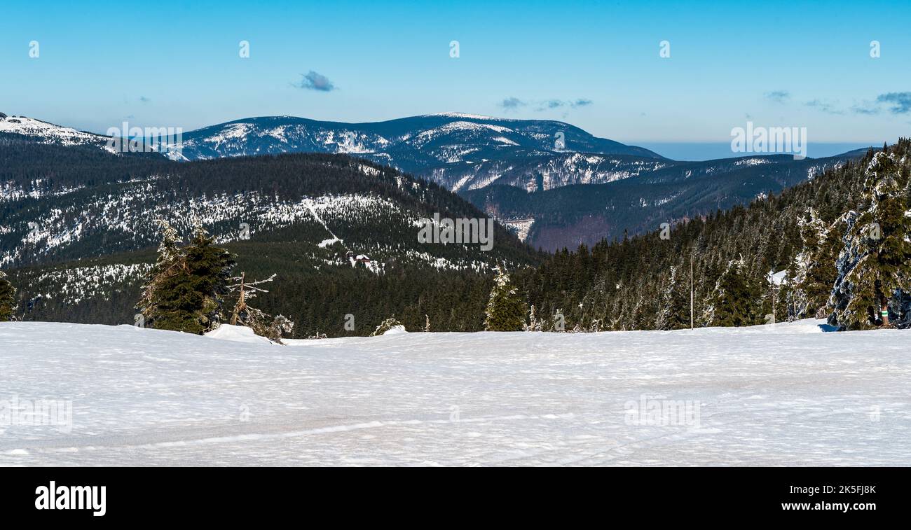 Vozka and Keprnik hills from hiking trail bellow Velky Maj hill in winter Jeseniky mountains in Czech republic Stock Photo