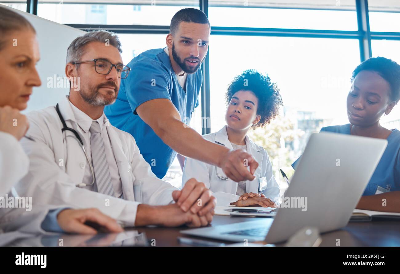 Medical, meeting and laptop for team in office in discussion ...