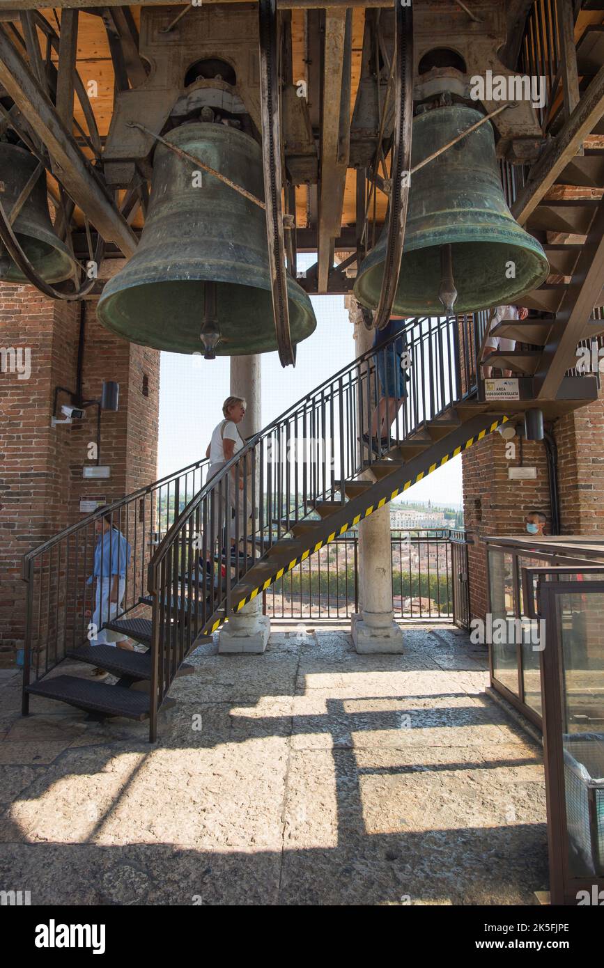 Lamberti Tower Verona, view in summer of tourists exploring the belfry of the Lamberti Tower in the historic centre of Verona, Italy Stock Photo