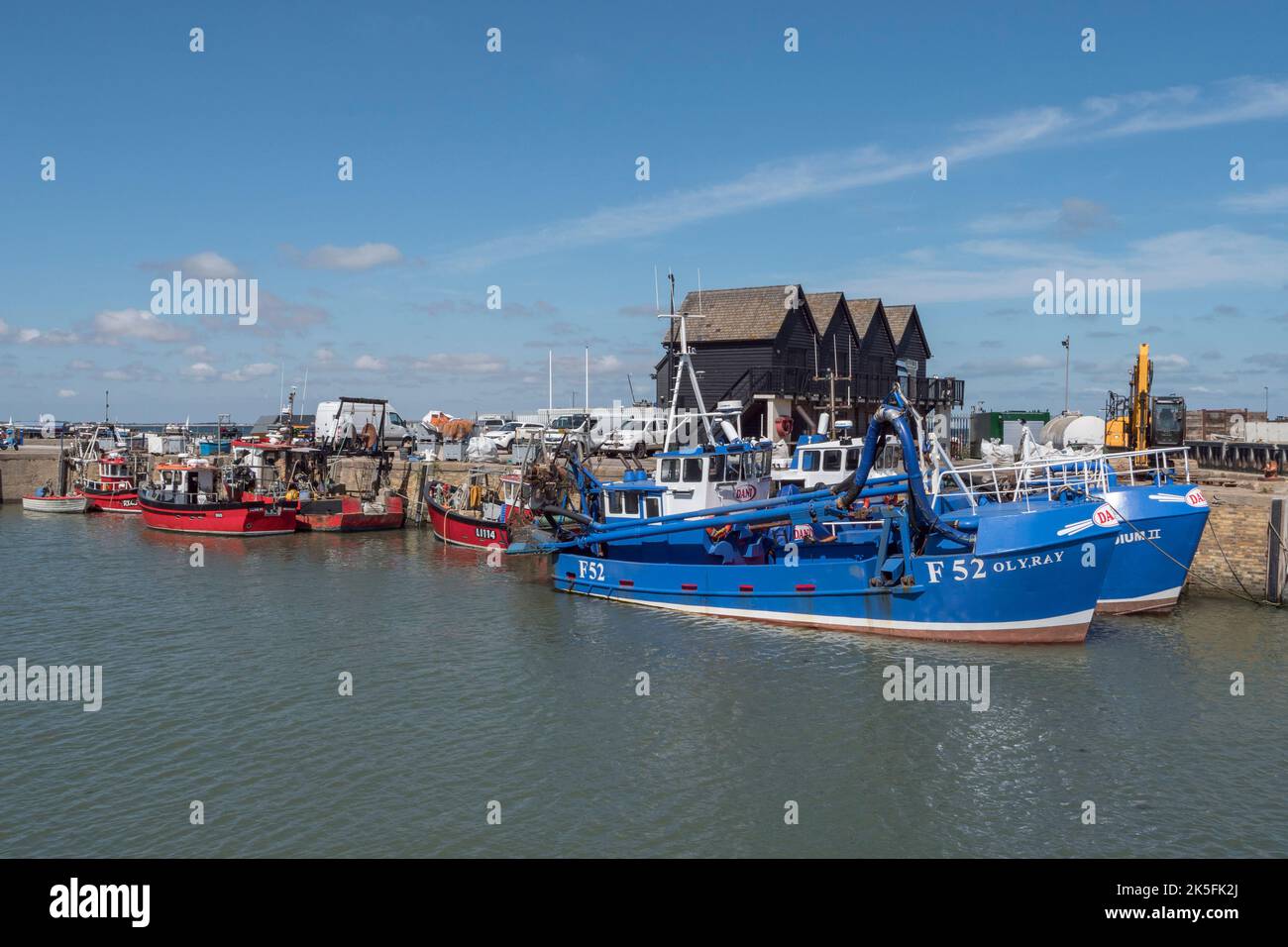 General view of fishing boats (F52 Oly Ray) in Whitstable Harbour, Whitstable, Kent, UK. Stock Photo