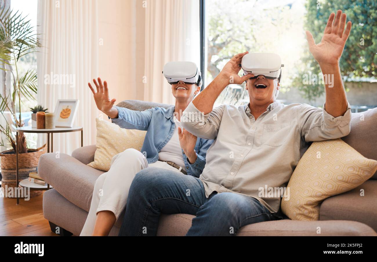 Virtual Reality, excited and senior couple with vr 3d goggles have fun, crazy and play digital game. Metaverse experience, esports simulation and Stock Photo