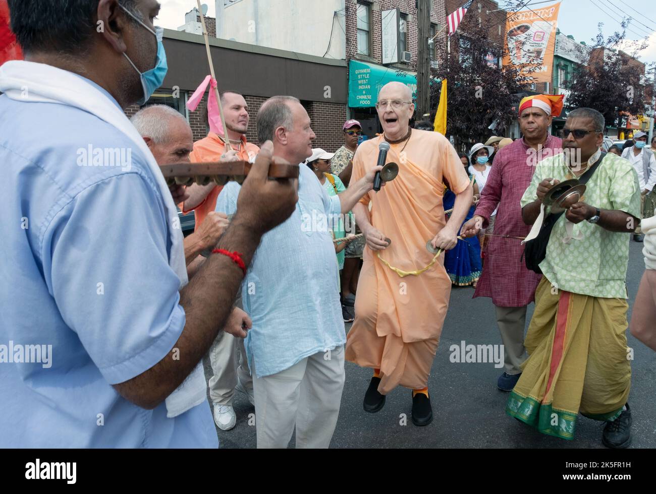 A leader of the hare Krishna Hindus chants and dances prior to the 2022 Ratha Yatra parade in Richmond Hills Queens, New York City. Stock Photo